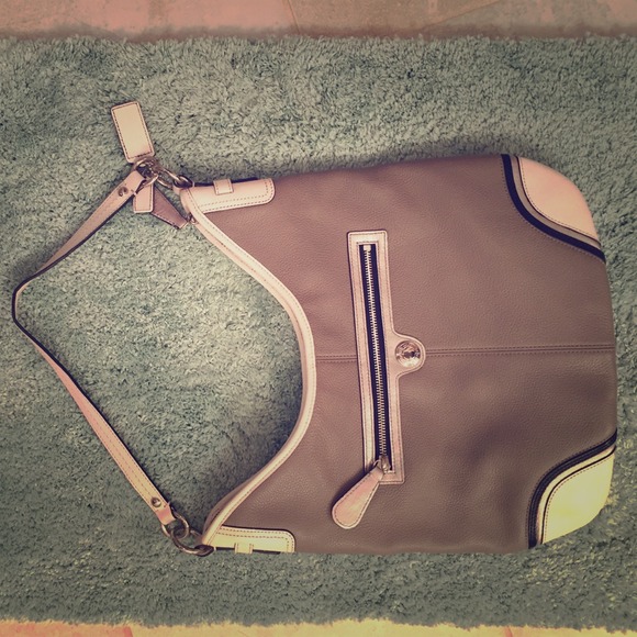 Gray and white leather coach bag.