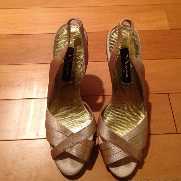 Gold satin peep toe heels with sling back
