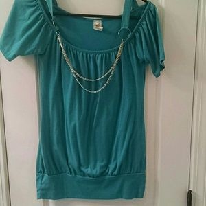 Teal top with gold jewelry details