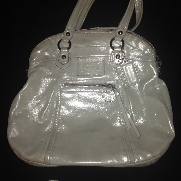 LOWERED PRICECoach poppy shimmering leather purse.