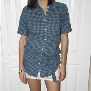 Plaid buttondown with short sleeves. Ties at waist