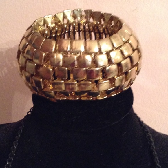 Large gold metal bracelet