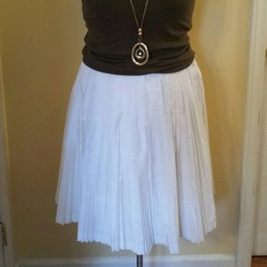 White pleated skirt