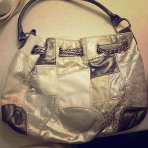 Silver and white purse