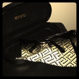 Never been worn, Versace sunglasses.