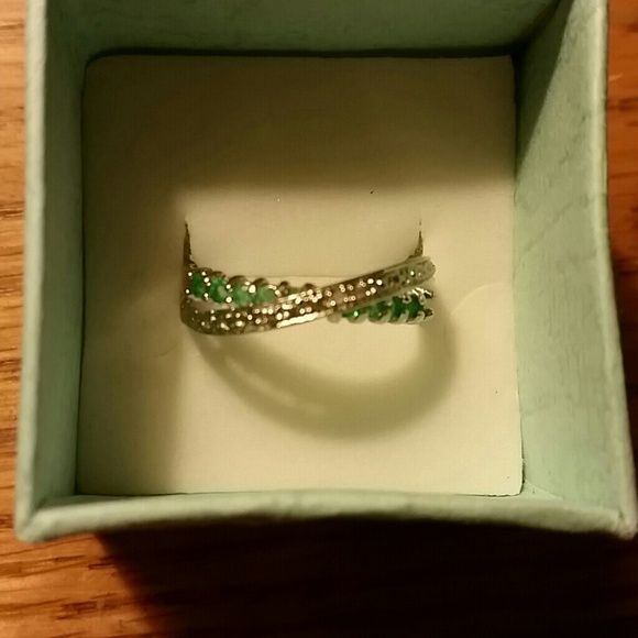 Silver and emerald ring