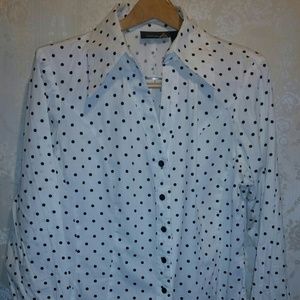 White and black polka dot blouse