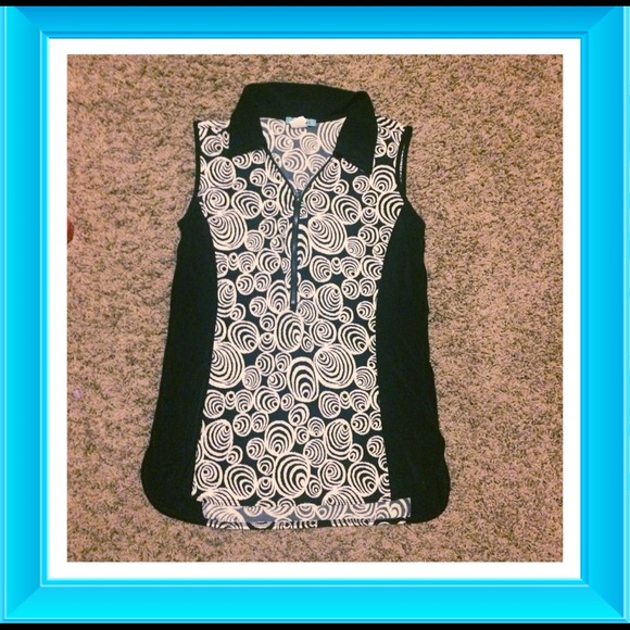 Black and white sleeveless blouse