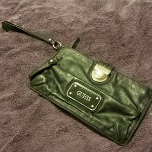 Guess faux leather wristlet/clutcg