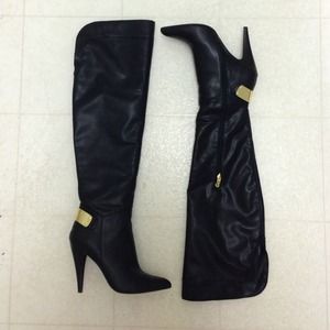 Knee-high boots by Fergie