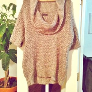 Chunky knit pullover with cropped arms.