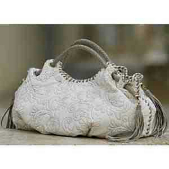 Searching for embroidered tassel hobo bag