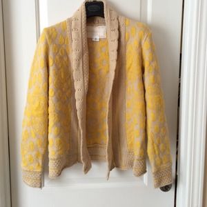 Bright yellow sweater by Cooperative
