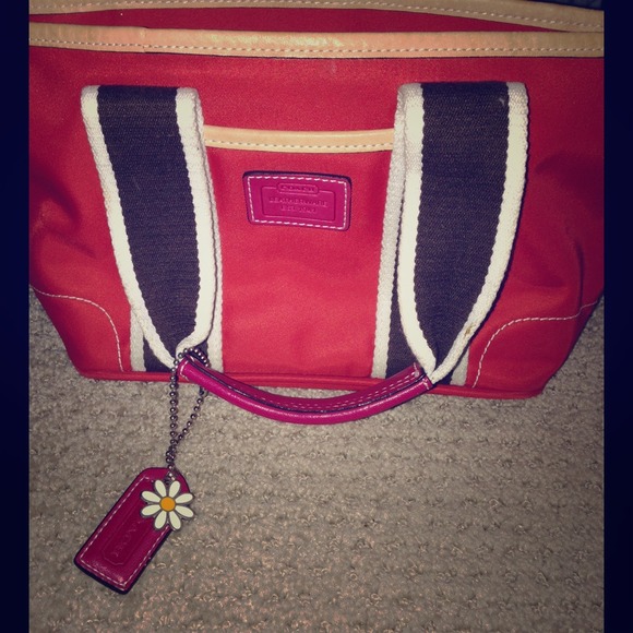 Small coach purse.  Dark orange.  Authentic.