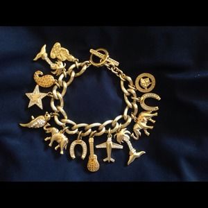 SOLD. Gianni Versace gold tone charm bracelet