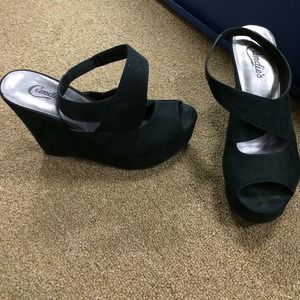 Suede black wedges.