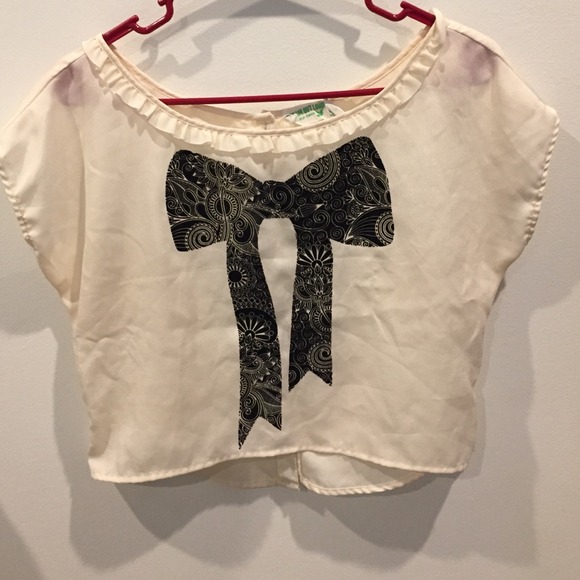 Cream shirt with velvet bow and button down back