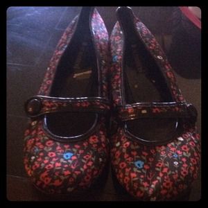 Floral pair of flats.red, green, blue flowers