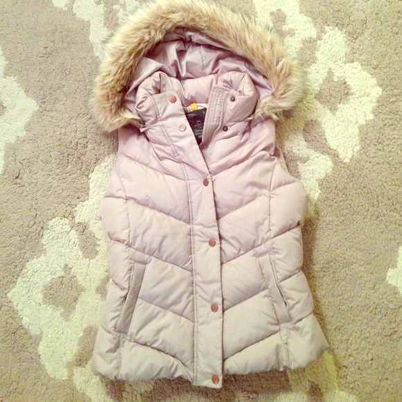 Down vest with fur hood