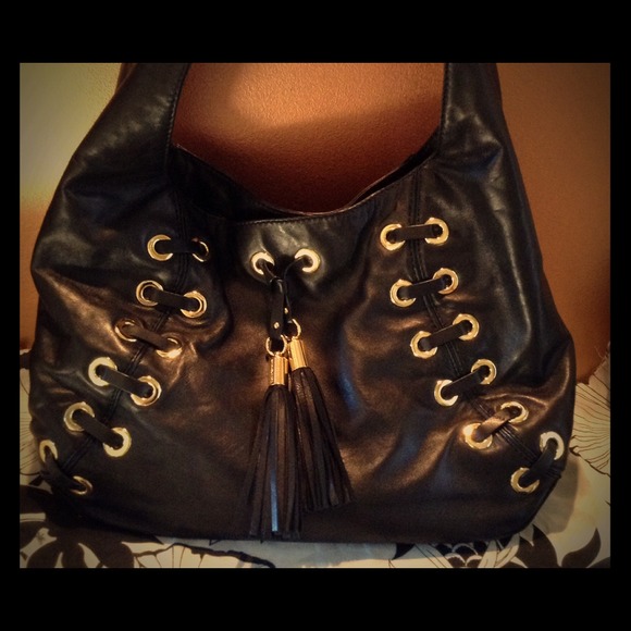 Michael Kors Astor Grommet Hobo in Black.