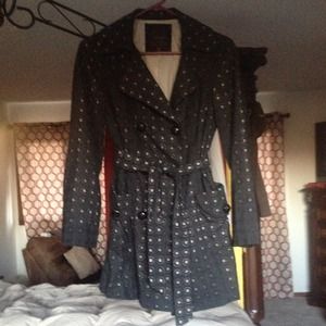 Black trench with cream background