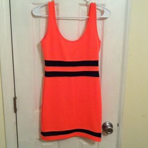 Neon orange and black bombshell dress