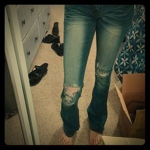 Bootcut ripped dollhouse jeans