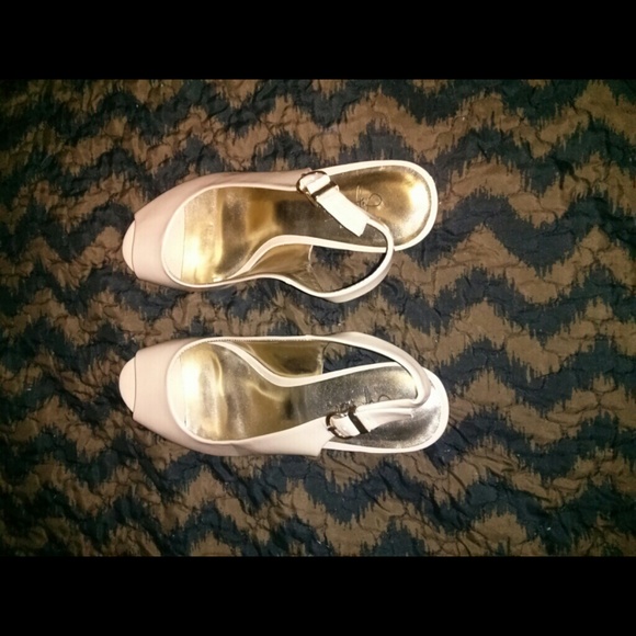 Nude patent heels