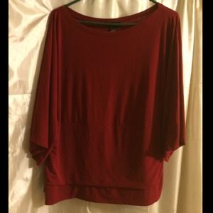 Pretty red wide neck blouse with side roushing