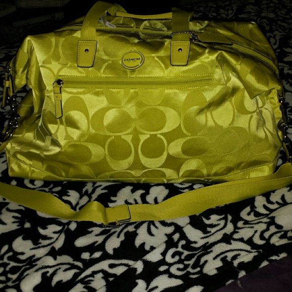 Brand New Coach overnight bag. Truce green.