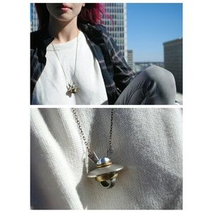 Spaceship necklace