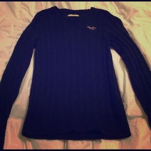 Long sleeve knit shirt.