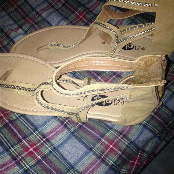 Tan and gold sandals