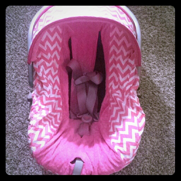 A cute pink car seat cover