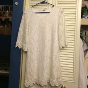 White lace dress with mid-length sleeve