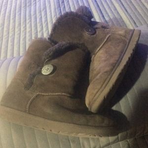 One button Uggs Boots brown.