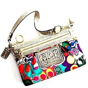 Coach poppy glam large wristlet NO TRADES.