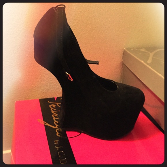 Black heel-less wedge. Only worn once