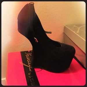 Black heel-less wedge. Only worn once