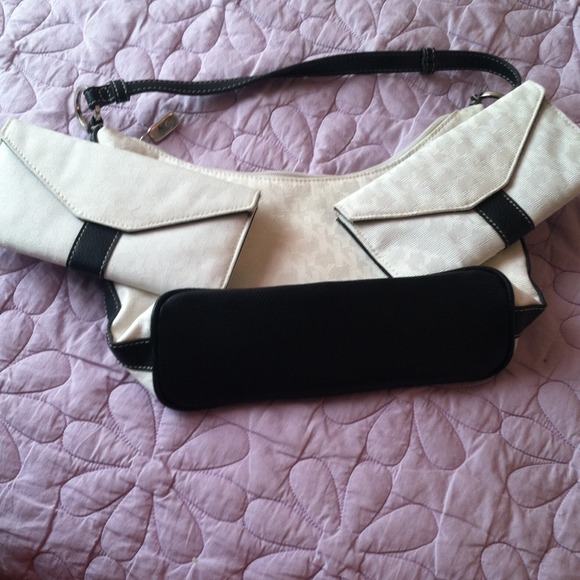 Black and white purse with wallet included