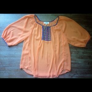 Neon orange blouse