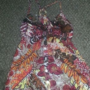 Shirt buttons down padded chest wooden circle