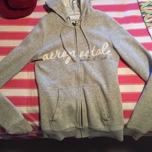 Zip up hoodie sweatshirt.