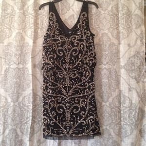 Short embellished dress. New without tags.