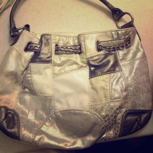 Silver and white purse