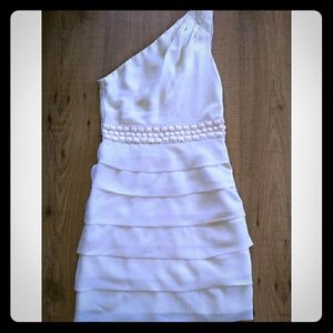 One shoulder tiered dress in Ivory.