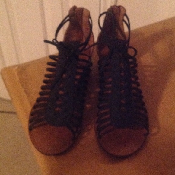 Black gladiator sandal with a small wedge heel