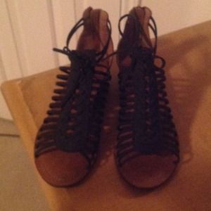 Black gladiator sandal with a small wedge heel