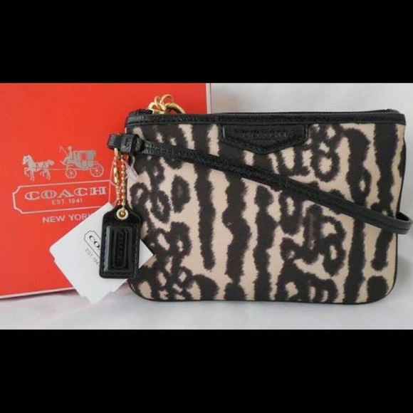 SOLD --Coach Ocelet Wristlet Leopard Print
