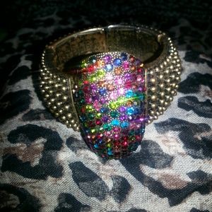 Oval shape bronze bracelet with colorful gem stone